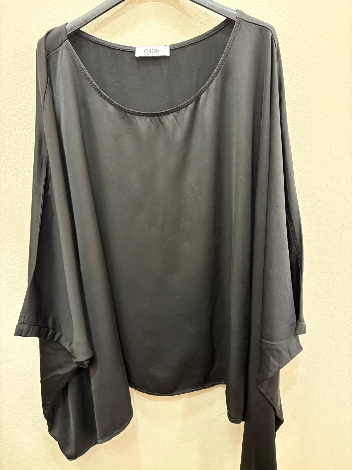 Blusa tipo capa
