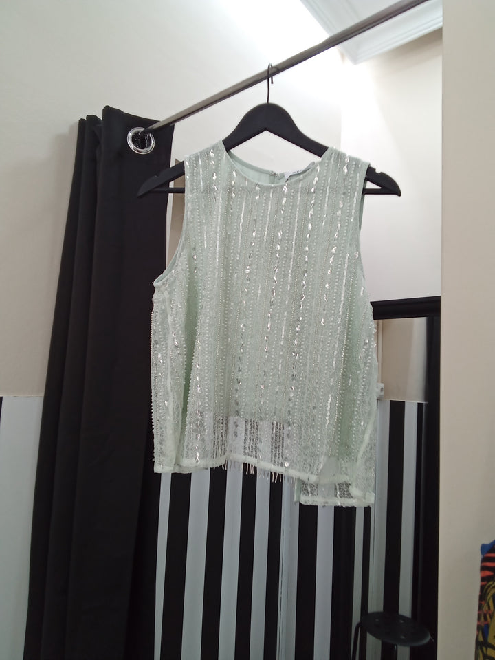 Top verde con lentejuelas